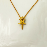 A gold-colored pendant featuring a star-shaped design with a natural brilliant diamond in the center, displayed against a white background.