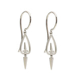 A pair of sterling silver earrings featuring a spire motif and old-world fretwork design.